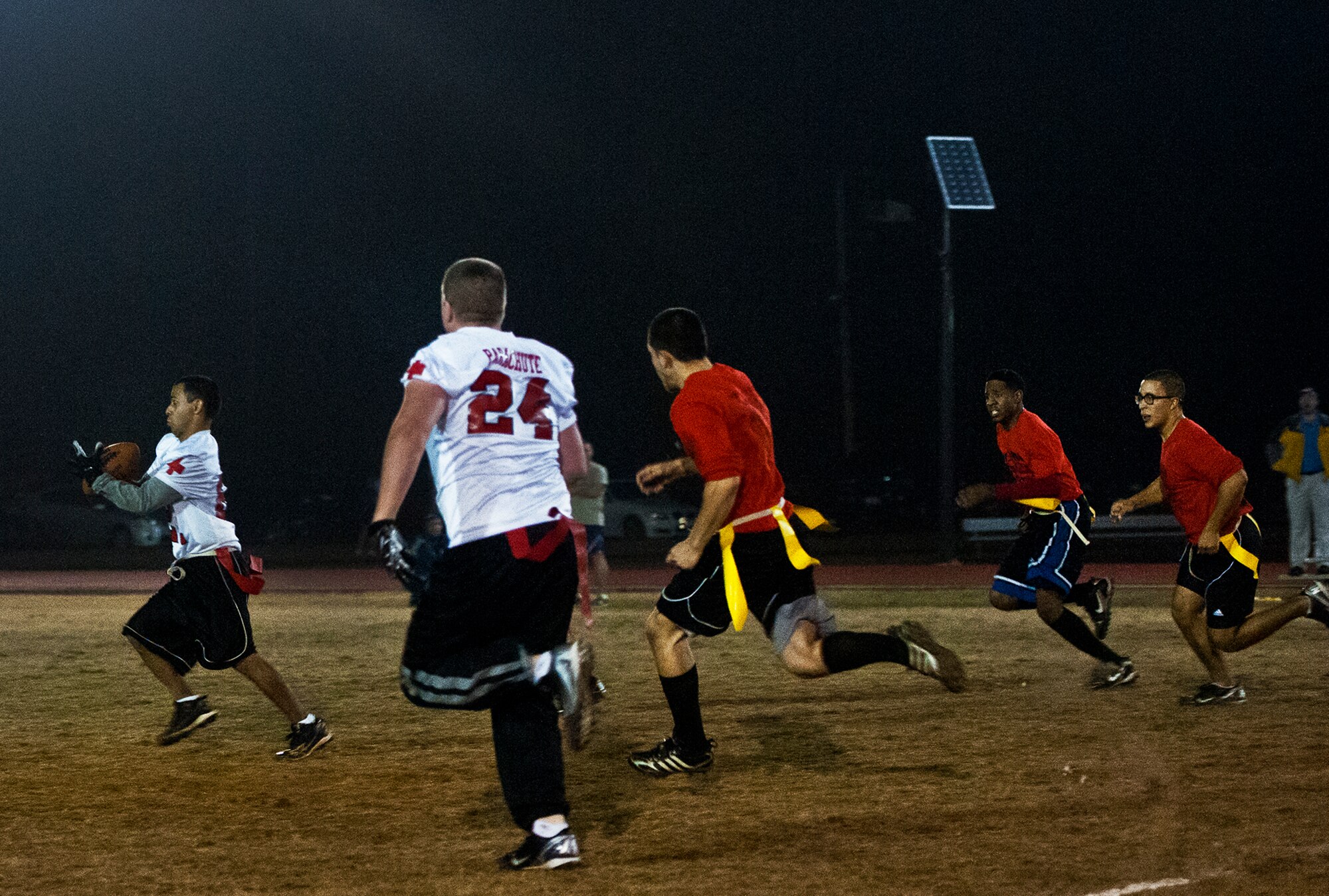 It was off to the races and a touchdown, when the 96th Medical Group team’s Andrew Salas caught a deep pass during the base intramural championship game against the Contracting Team Jan. 9 at Eglin Air Force Base, Fla.  The Medical Group won easily 33-16. (U.S. Air Force photo/Samuel King Jr.)