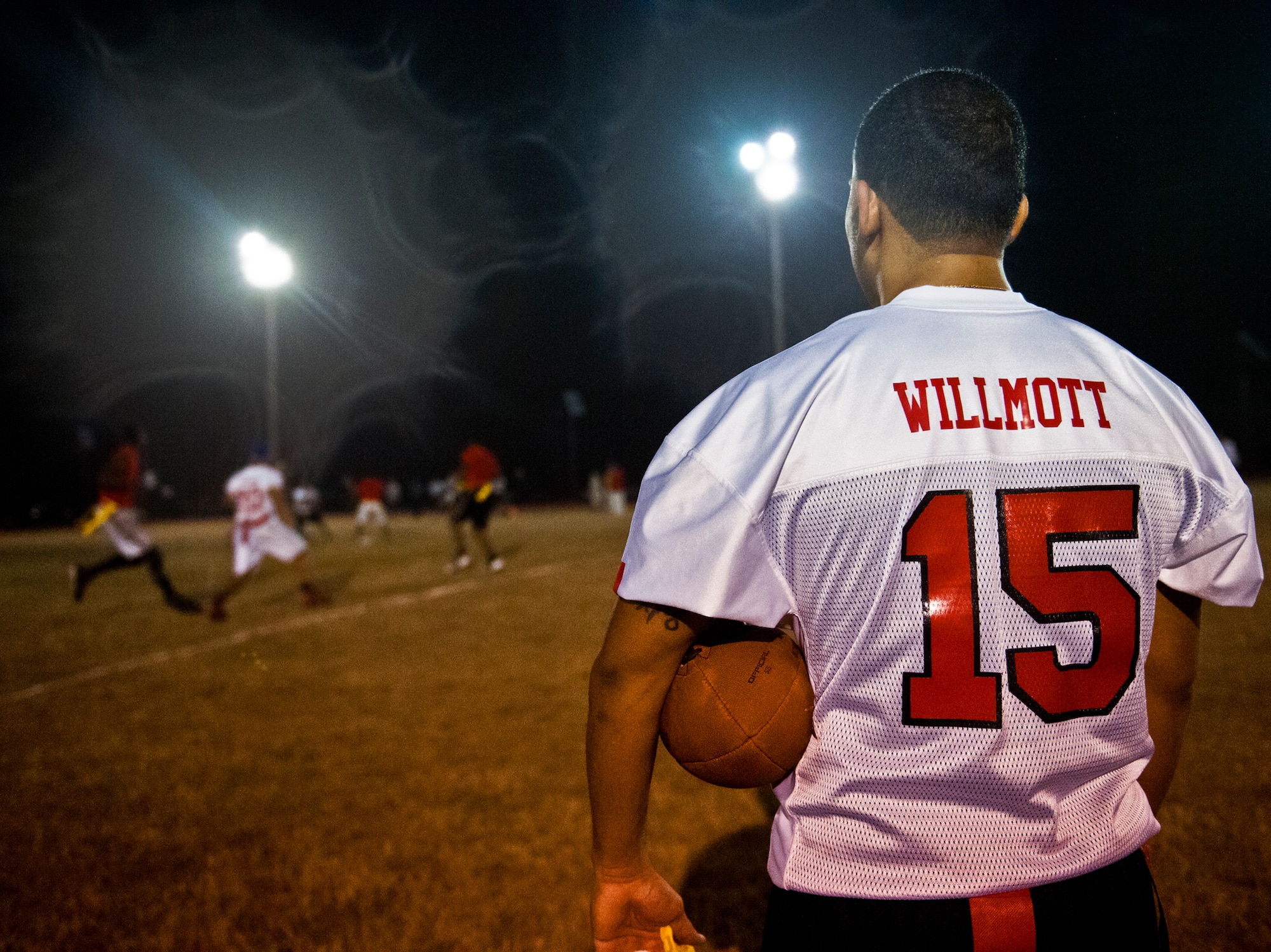 Derek Willmott, the center for the 96th Medical Group, keeps his team’s ball dry despite the mist during the team’s match against the Contracting Team for the base intramural championship Jan. 9 at Eglin Air Force Base, Fla.  The Medical Group won easily 33-16. (U.S. Air Force photo/Samuel King Jr.)