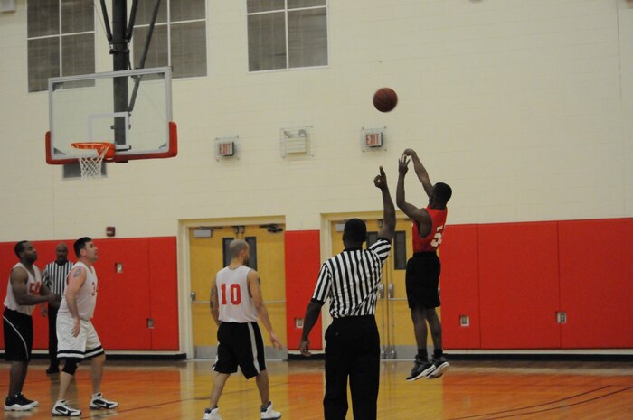 MARINE CORPS BASE QUANTICO, Va. (Jan 11.) – Micheal Schlegel, a player for Combat Service Support’s intramural basketball team shoots toward the hoop during an American League intramural basketball game against Air Force Office of Special Investigations at Barber Physical Activity Center on Jan. The final score was AFOSI 39, CSS 34.