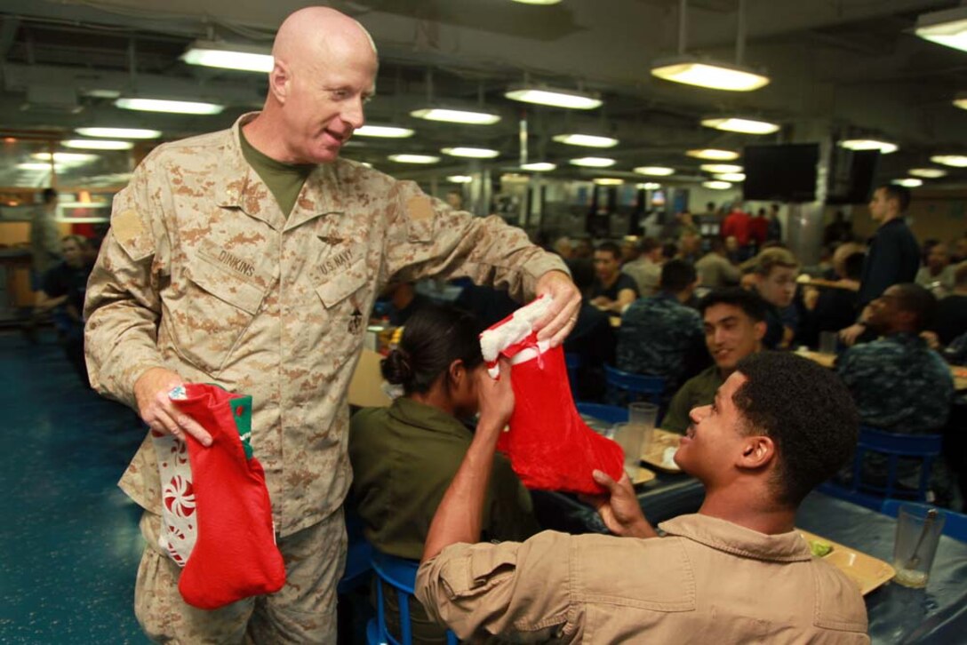 A Christmas tree is displayed on the troop mess decks aboard the USS Peleliu, Dec. 21. The 15th MEU is deployed as part of the Peleliu Amphibious Ready Group as a U.S. operations and theater security cooperation efforts in the U.S. 5th Fleet area of responsibility. (U.S. Marine Corps photo by Cpl. John Robbart III)