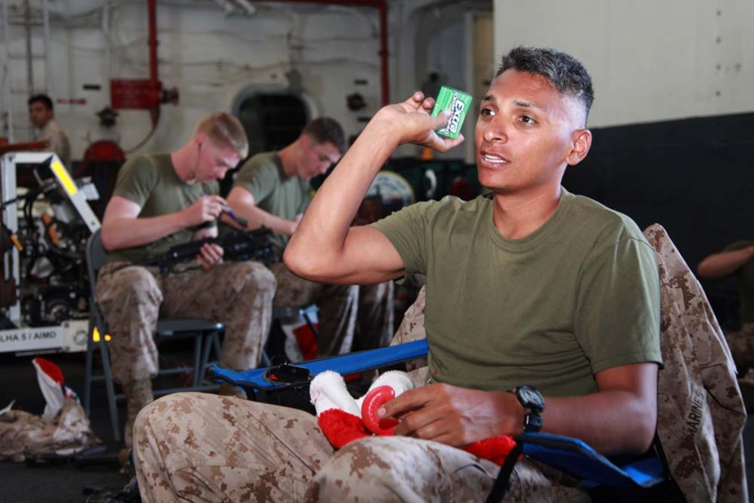 A Christmas tree is displayed on the troop mess decks aboard the USS Peleliu, Dec. 21. The 15th MEU is deployed as part of the Peleliu Amphibious Ready Group as a U.S. operations and theater security cooperation efforts in the U.S. 5th Fleet area of responsibility. (U.S. Marine Corps photo by Cpl. John Robbart III)