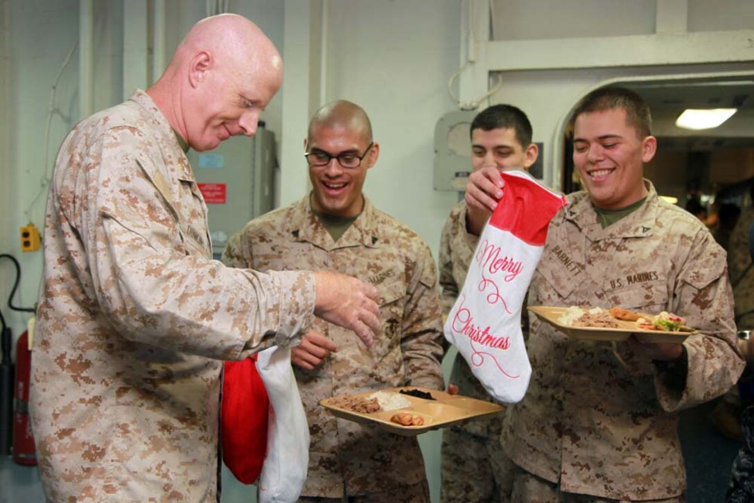 A Christmas tree is displayed on the troop mess decks aboard the USS Peleliu, Dec. 21. The 15th MEU is deployed as part of the Peleliu Amphibious Ready Group as a U.S. operations and theater security cooperation efforts in the U.S. 5th Fleet area of responsibility. (U.S. Marine Corps photo by Cpl. John Robbart III)