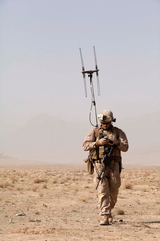 U.S. Marine Corps Lance Cpl. Bradley L. Coy, a machine gunner assigned to combined anti-armor team, Fox Company, 2nd Battalion, 7th Marine Regiment (Fox 2/7), operates a Wolfhound Hand Held Warning System near Combat Outpost Now Zad, Helmand province, Afghanistan, Dec. 29, 2012. Coy, originally from Bakersfield, Calif., deployed to Afghanistan with 2/7 in support of Operation Enduring Freedom. (U.S. Marine Corps photo by Cpl. Alejandro Pena/Released)