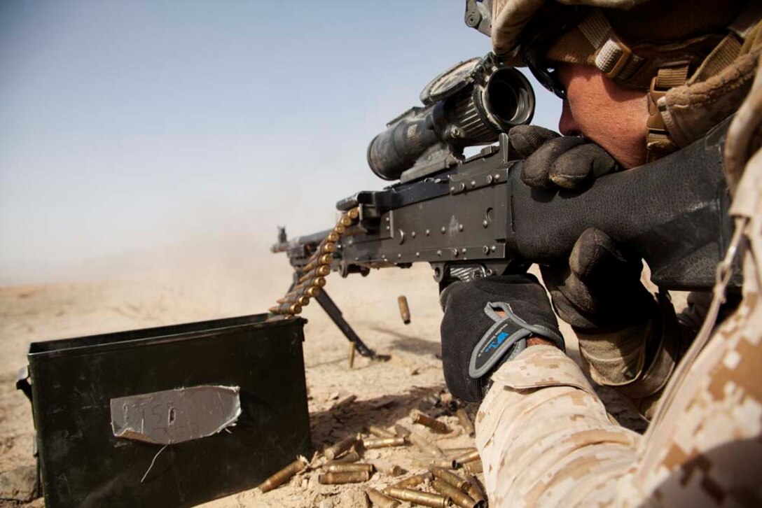 U.S. Marine Corps Sgt. Daniel J. Vansittere, a rifleman assigned to Police Advisory Team 5, 2nd Battalion, 7th Marine Regiment (2/7), fires a M240B machine gun while conducting live fire training near Combat Outpost Now Zad, Helmand province, Afghanistan, Dec. 29, 2012. Vansittere, originally from Ozarks, Mo., deployed to Afghanistan with 2/7 in support of Operation Enduring Freedom.  (U.S. Marine Corps photo by Cpl. Alejandro Pena/Released)