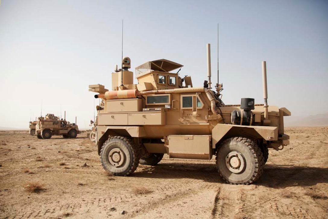 U.S. Marines assigned to combined anti-armor team, Fox Company, 2nd Battalion, 7th Marine Regiment (Fox 2/7), stage their vehicles prior to conducting live fire training near Combat Outpost Now Zad, Helmand province, Afghanistan, Dec. 29, 2012. The Marines of Fox 2/7 conducted live fire training to maintain operational readiness and proficiency. (U.S. Marine Corps photo by Cpl. Alejandro Pena/Released)