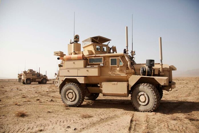 U.S. Marines assigned to combined anti-armor team, Fox Company, 2nd Battalion, 7th Marine Regiment (Fox 2/7), stage their vehicles prior to conducting live fire training near Combat Outpost Now Zad, Helmand province, Afghanistan, Dec. 29, 2012. The Marines of Fox 2/7 conducted live fire training to maintain operational readiness and proficiency. (U.S. Marine Corps photo by Cpl. Alejandro Pena/Released)