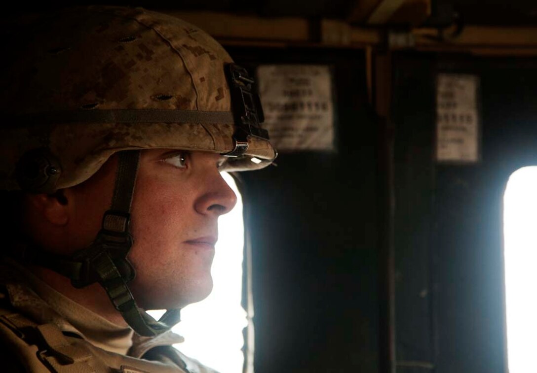 U.S. Marine Corps Lance Cpl. Joe Dalbec, a machine gunner assigned to combined anti-armor team, Fox Company, 2nd Battalion, 7th Marine Regiment (Fox 2/7), waits to conduct live fire training near Combat Outpost Now Zad, Helmand province, Afghanistan, Dec. 29, 2012. The Marines of Fox 2/7 conducted live fire training to maintain operational readiness and proficiency. (U.S. Marine Corps photo by Cpl. Alejandro Pena/Released)