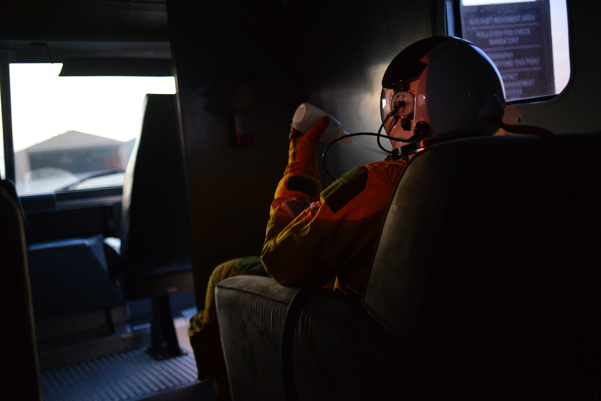 U-2 pilot Capt. Travis utilizes a specialized bottle to drink an energy drink prior to flight in a U-2, Jan. 8, 2013, at Beale Air Force Base, Calif. Due to the long duration of flights, U-2 pilots must utilize specialized equipment to drink and eat.  (U.S. Air Force photo by Airman 1st Class Drew Buchanan/Released)