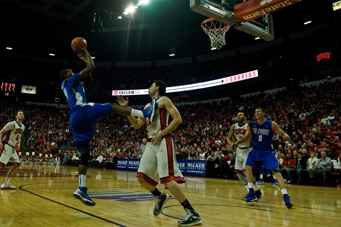 Michael Lyons, U.S. Air Force Academy Falcons senior guard, shoots a jump shot against the University of Nevada Las Vegas, Jan. 12, 2013, at the Thomas and Mack Center in Las Vegas. The Falcons are 9-5 on the season and 1-1 in the Mountain West Conference. (U.S. Air Force photo by Senior Airman Daniel Hughes)