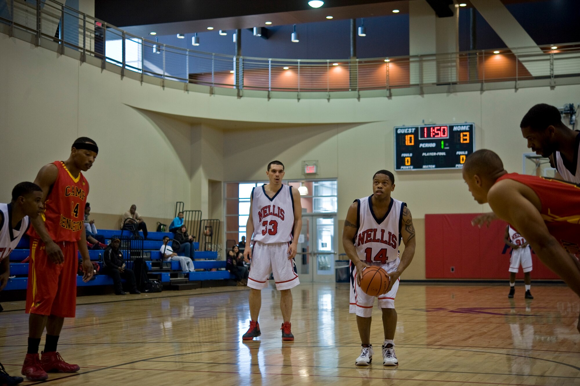 An Airman from the Nellis team shoots a foul shot during a Pacific West Military Basketball League game against the Marines from Camp Pendleton, Calif., Jan. 12, 2013, at Nellis Air Force Base, Nev.  Nellis fell to 0-2 during the weekend event hosted in the Warrior Fitness Center after being beaten by Camp Pendleton and Fort Bliss, Texas. (U.S. Air Force photo by Senior Airman Daniel Hughes)