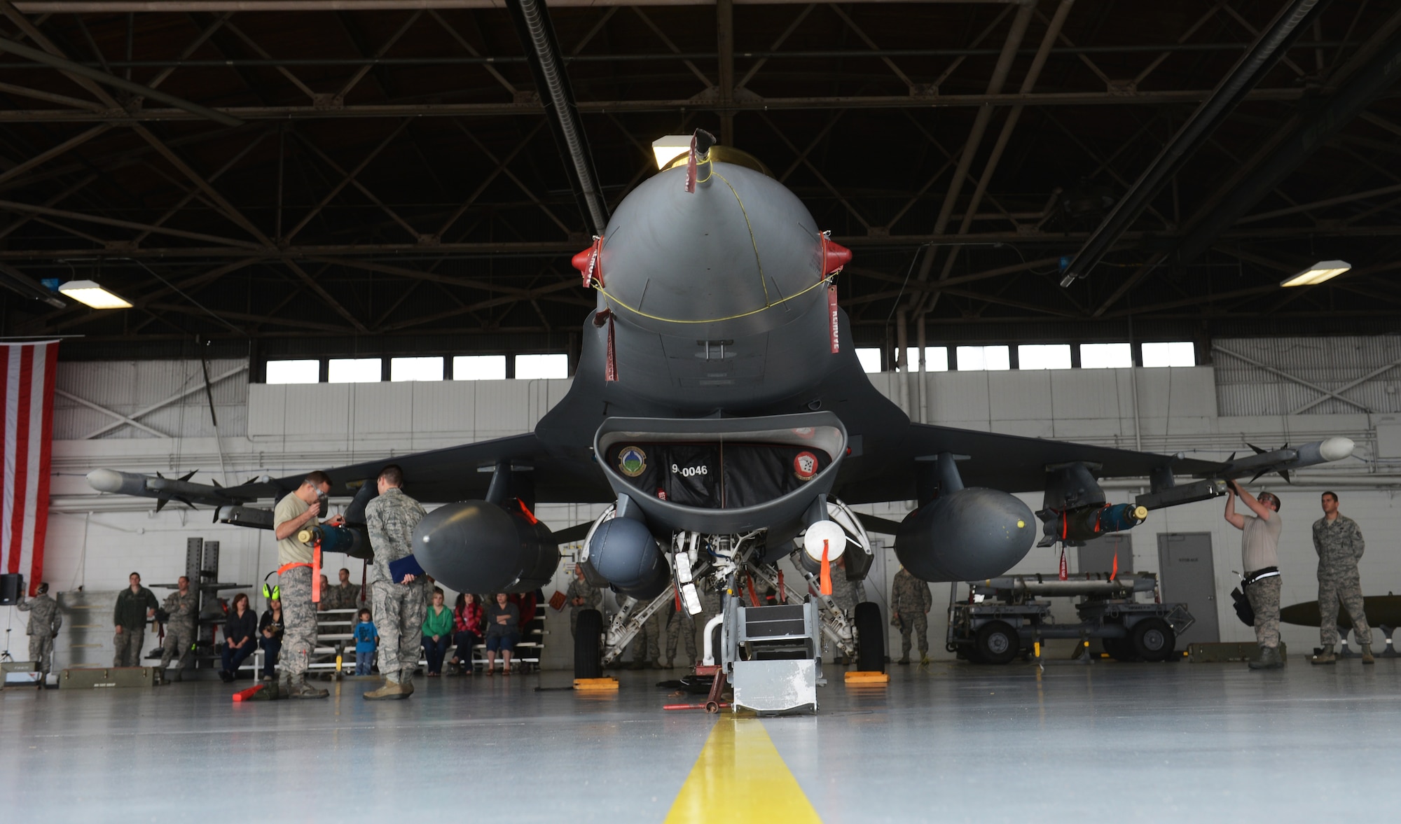 The 79th "Tigers"  aircraft maintainers are evaluated while preparing the F-16 Fighting Falcon's weapons load at Shaw Air Force Base, S.C., Jan. 11, 2013. During the fourth Weapons Load Crew of the Quarter competition, two crews competed to become eligible for the Load Crew of the Year. The winners were the 79th "Tigers."  (U.S. Air Force photo by Senior Airman Tabatha Zarrella/Released)
