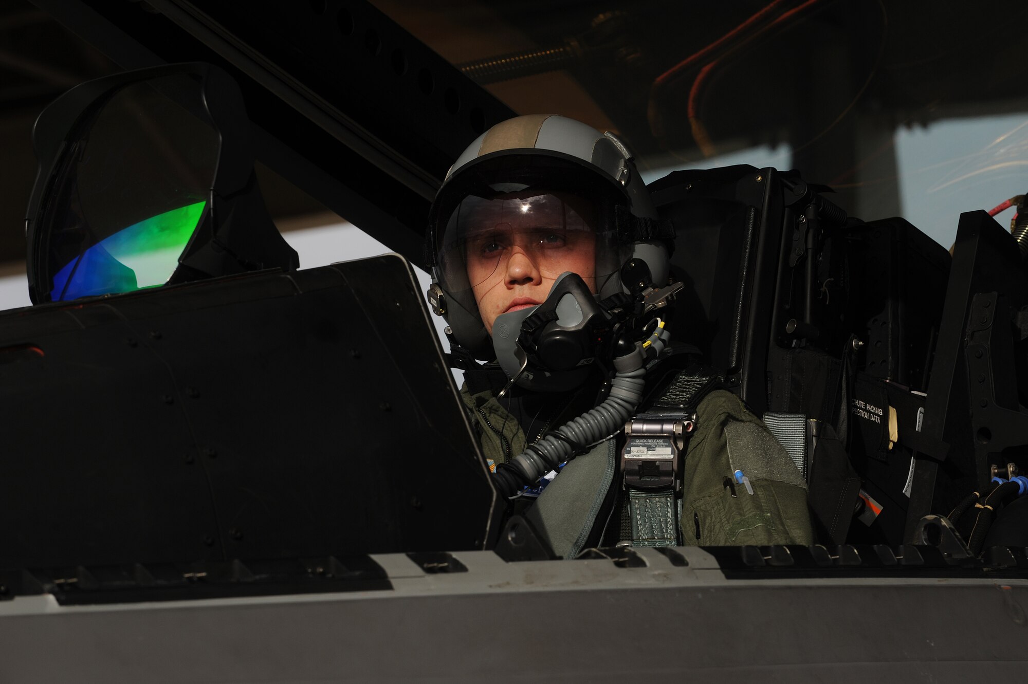 U.S. Air Force Capt. George Cannon, 94 th Fighter Squadron F-22 pilot, prepares for departure from Langley Air Force Base, Va., Jan. 11, 2013. F-22A Raptors and about 300 Airmen from the 1st Fighter Wing, Joint Base Langley-Eustis, Va., and the 192nd FW, Va. Air National Guard, deployed to Kadena Air Base, japan, on a rotation to evaluate the readiness in the Asia-Pacific region. (U.S. Air Force photo by Staff Sgt. Antoinette Gibson/Released)