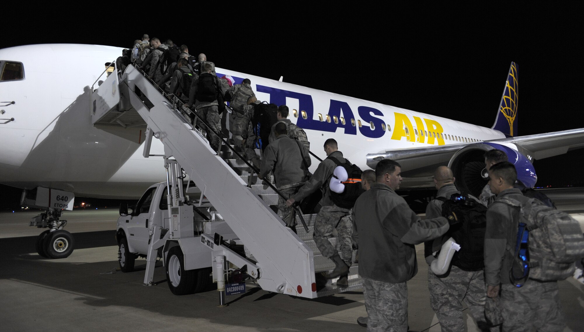 U.S. Airmen from the 1st Fighter Wing and the 192nd FW prepare to head to Kadena Air Base, Japan as part of a Pacific Air Command Theater Security Package deployment. These deployments display the United States’ continued commitment to maintain peace in the Asia-Pacific region.(U.S. Air Force photo by Airman 1st Class Teresa Aber/Released)