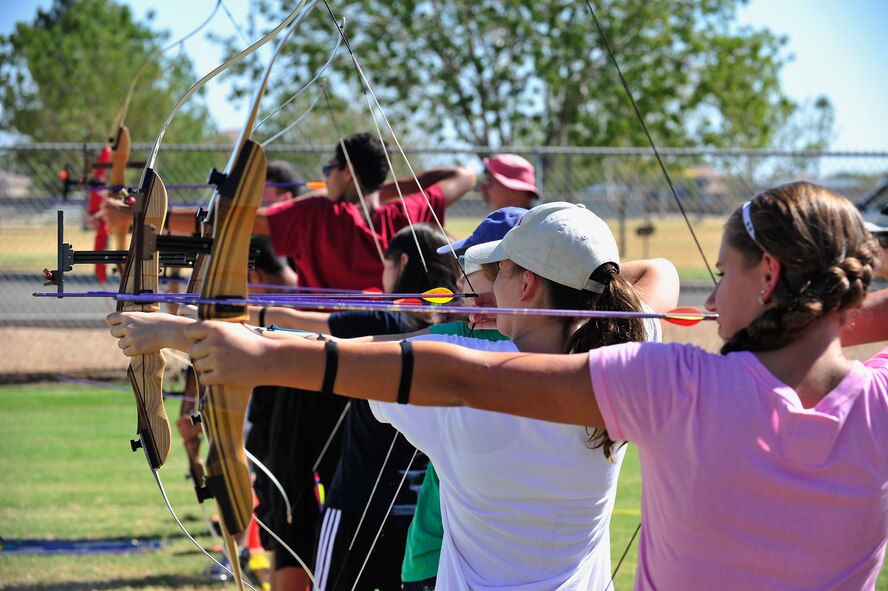 Students take aim at targets during the youth and teen archery camp Oct. 9. Thirty children were taught by instructors from Papago FITA archers during the four-day course. (U.S. Air Force photo/Staff Sgt. Jason Colbert)