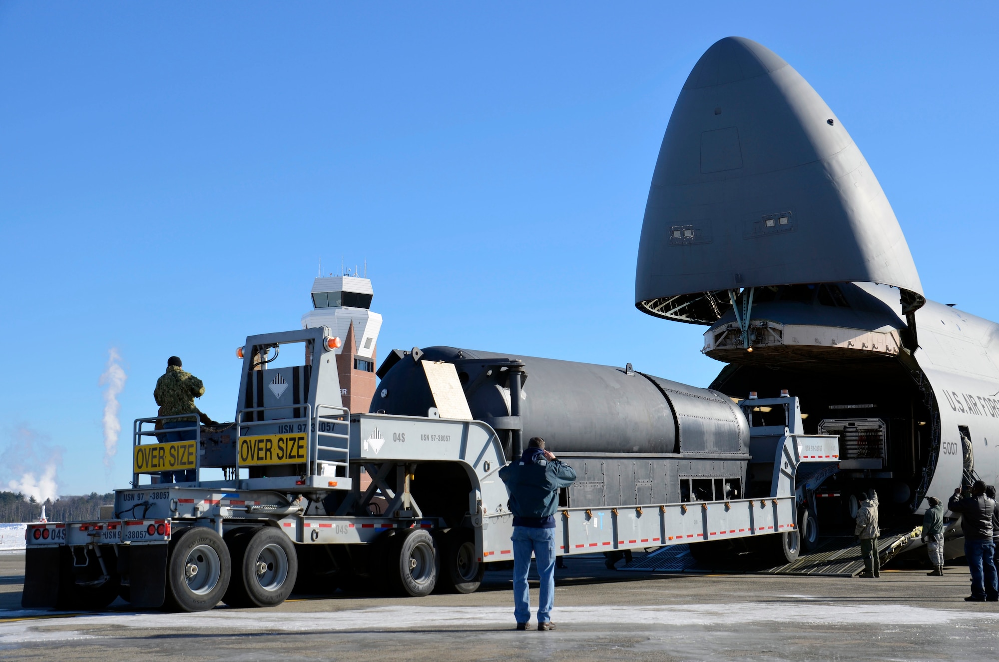Aerial porters from Westover Air Reserve Base load a U.S. Navy SEAL Delivery Vehicle onto a C-5M from Dover Air Force Base, Del. The SDV is a manned submersible and a type of swimmer delivery vehicle used to carry SEALs for special and covert operations. (U.S. Air Force photo by SrA. Kelly Galloway)