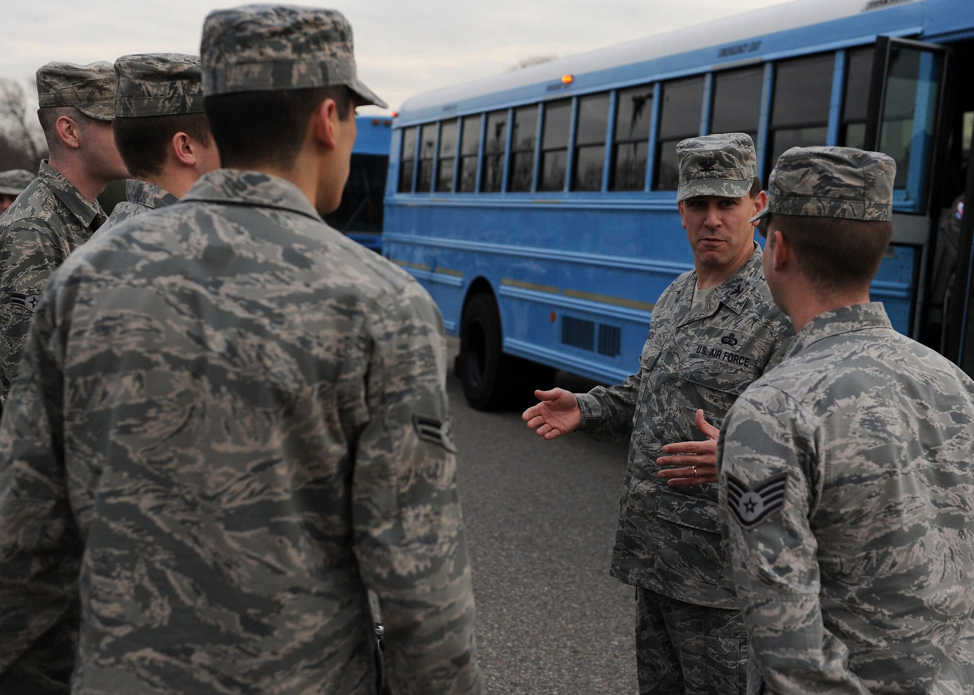 Col. Korvin Auch, 633rd Wing commander, speaks with Airmen prior to departure for a deployment at Langley Air Force Base, Va., Jan. 8, 2013. Auch came out to visit with the Airmen before their departure to Kadena Air Base, Japan. (U.S. Air Force photo by Staff Sgt. Ciara Wymbs/Released)