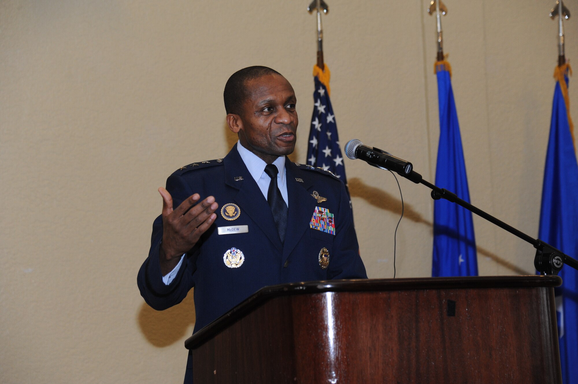 Lt. Gen. Darren McDew, 18th Air Force commander, Scott Air Force Base, Ill., speaks at the annual Dr. Martin Luther King Jr. Memorial Luncheon Jan. 10, 2013, at the Bay Breeze Event Center, Keesler Air Force Base, Miss.  He spoke about the importance of remembering King's legacy and using it to uphold the Air Force's core value of excellence.  McDew also toured the 403rd Wing during his visit at Keesler.  (U.S. Air Force photo by Kemberly Groue)