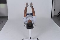 Dumbbell bench press
Grab a pair of dumbbells, lie on back on a flat bench and hold the dumbbells above chest. Palms should be facing inward. Lower one dumbbell to the side of chest, while simultaneously rotating wrists so palm faces forward. Pause, then press weight back up to starting position quickly, while rotating wrists so palms are once again facing inward. Repeat with other arm. ( U.S. Air Force photo by Don Lindsey)
