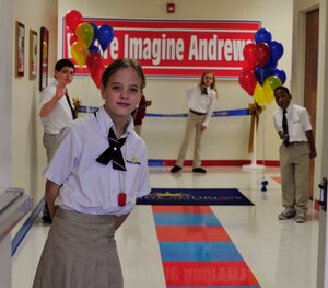 Imagine Andrews Students meet-and-greet visitors, Jan. 14, 2013, during a ribbon-cutting ceremony at their newly opened public charter school on Joint Base Andrews, Md. The new building provides larger classrooms, a cafeteria, as well as a media and music room. (U.S. Air Force photo/ Airman 1st Class Erin O’Shea)