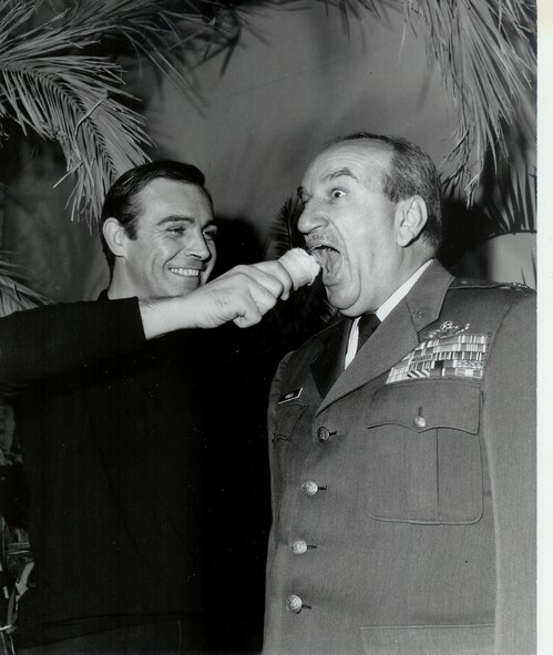 Sean Connery feigns shoving a vanilla ice cream cone in Retired Lt. Col. Charles Russhon’s face during the production of “Thunderball.” Russhon was the military advisor to the James Bond films in the ‘60s and ‘70s. Russhon and Connery became friends on set. The vanilla ice cream cone had special significance to Russhon, who inspired the “Charlie Vanilla” character, an ice cream loving mister fix-it, in friend and esteemed American cartoonist Milton Caniff’s comic strip “Steve Canyon.” (Courtesy photo/Christian Russhon) 
