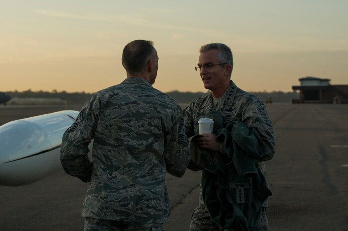 Gen. Paul Selva, Air Mobility Command commander, speaks to Chief Master Sgt. Larry Williams, 437th Airlift Wing command chief, before departing Joint Base Charleston – Air Base, S.C., Jan. 8, 2013. 
While in Charleston, Selva hosted an All Call for JB Charleston Airmen.
During the All Call, the general presented his three priorities for Mobility
Airmen: Executing the mission; Cultivating a caring and respectful
workplace; and Training Airmen.  (U.S. Air Force photo/Senior Airman George
Goslin)
