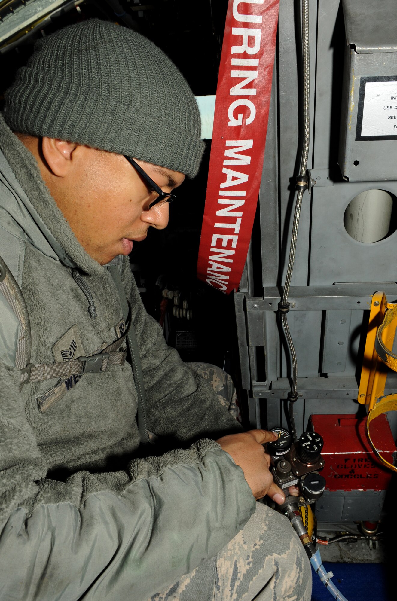 Staff Sgt. Dominique West, 20th Aircraft Maintenance Unit crew chief, inspects an emergency oxygen tank on Barksdale Air Force Base, La., Jan. 11. In the event of an onboard oxygen system malfunction, the emergency oxygen tanks are used by the aircrew. Crew chiefs inspect the tanks to ensure they are serviceable. (U.S. Air Force photo/Airman 1st Class Benjamin Gonsier)