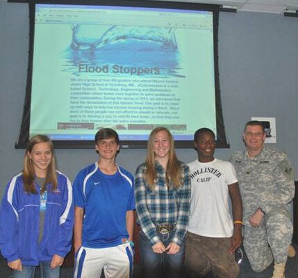 Flood Stoppers eCYBERMISSION Team poses with ERDC Commander Col. Kevin Wilson.