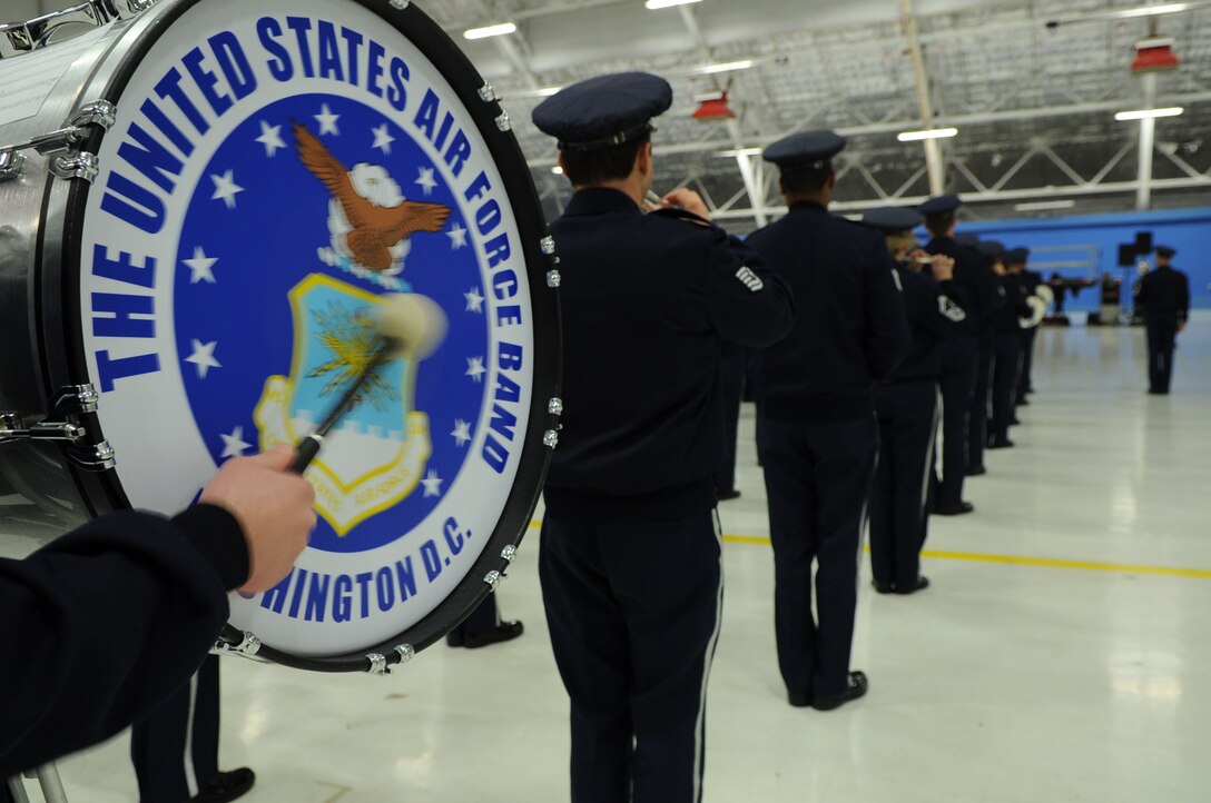 The Air Force Band plays "The U.S. Air Force Song" during a rehearsal on Joint Base Andrews, Md., Jan. 11, 2013, to prepare for the 57th presidential inaugural parade. About 15,000 military personnel from 133 units will be participating in the parade on Inauguration Day, Jan. 21, 2013. 