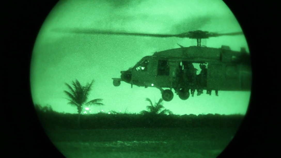 Marines with the Force Reconnaissance Platoon, Maritime Raid Force, 31st Marine Expeditionary Unit, land in a UH-60 Blackhawk helicopter in the beginning stages of a raid here, Jan. 9. The training was part of the semiannual Realistic Urban Training Exercise, a long-range raid scenario to raise the proficiency of the MRF. The 31st MEU is the only continuously forward-deployed MEU and the Marine Corps’ force in readiness in the Asia-Pacific region.