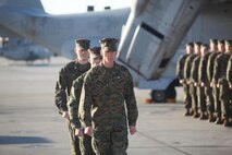 Marines with Marine Medium tiltrotor Squadron 266 witness,pilot Capt. Erik Kolle, along with crew chiefs Staff Sgt. David Porter, and Sgt. Daniel Howington, recieve the Air Medal with combat distiguishing device for displaying superior airmanship during the rescue of a downed U.S. pilot. The ceremony took place aboard Marine Corps Air Station New River, January 7. 
