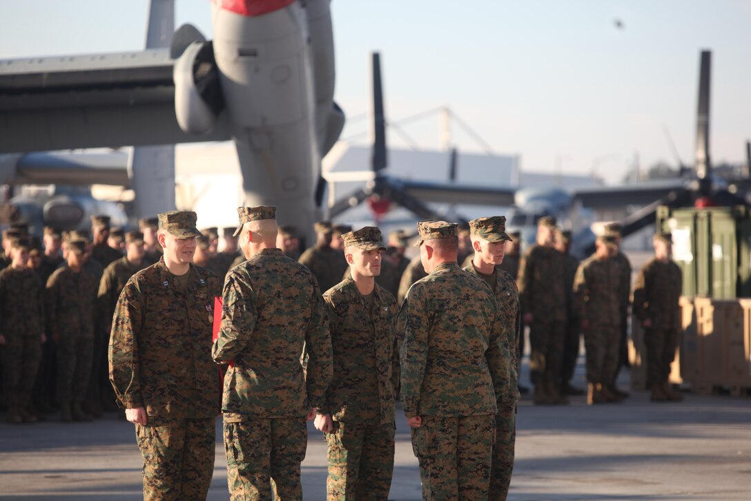 Marines with Marine Medium tiltrotor Squadron 266, Capt. Erik Kolle, pilot, along with crew chiefs Staff Sgt. David Porter, and Sgt. Daniel Howington, were awwarded the Air Medal with combat distiguishing device for displaying superior airmanship during the rescue of a downed U.S. pilot. The ceremony was held aboard Marine Corps Air Station New River, Jan. 7. 