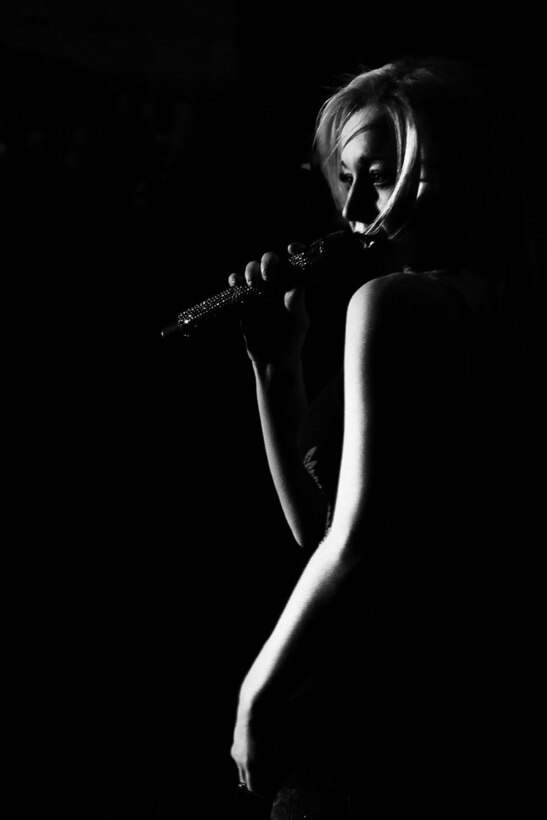 Kellie Pickler performs on stage in front of Combat Center Marines May 19, 2012, at Lance Cpl. Torrey L. Gray Field.

