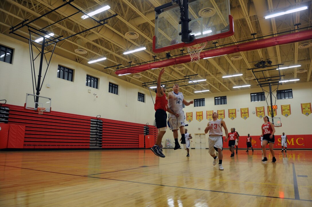 Charles Jones, player with Marine Corps Embassy Security Group’s intramural basketball team, goes up for a lay-up during the intramural basketball game against Marine Corps Air Facility team, at the Barber Physical Fitness Center on Jan. 14. MCAF kept the lead the entire game to win, 49-36. 