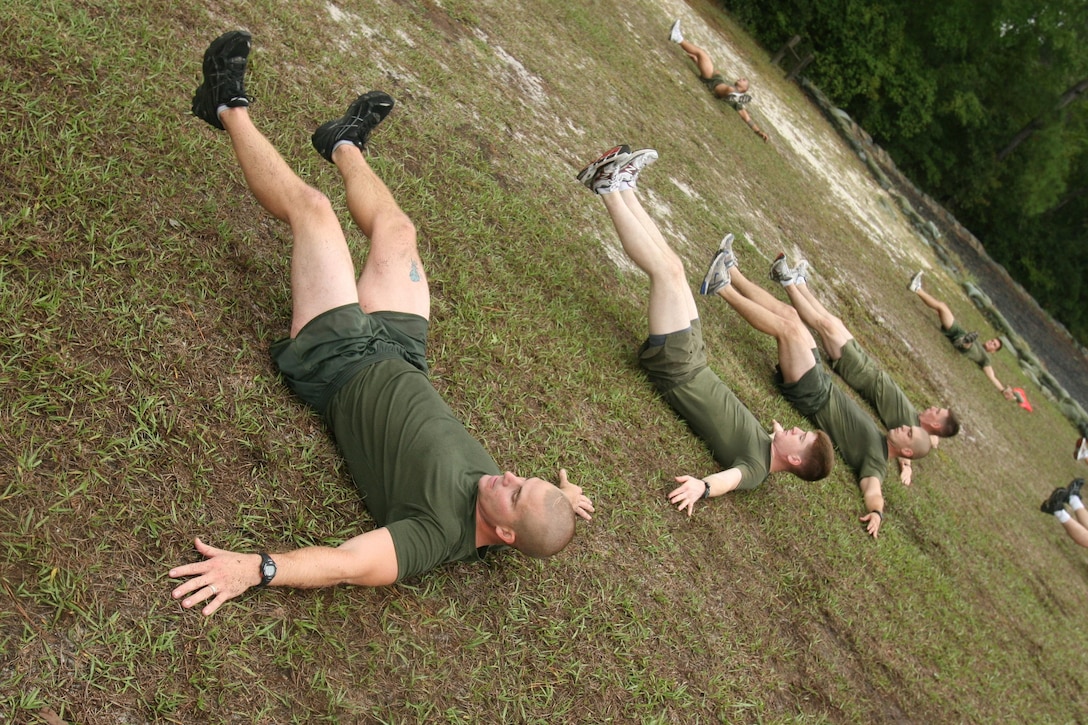 Marines with U.S. Marine Corps Forces, Special Operations Command conduct dynamic warmup exercises as part of MARSOC's Performance and Resiliency program aboard Camp Lejeune, N.C., Oct. 1, 2010. The PERRES program is a holistic approach to physical fitness, performance enhancement and injury prevention that emphasizes personal and unit development of the mind, body and spirit. (U.S. Marine Corps photo by Cpl. Kyle McNally/Released)