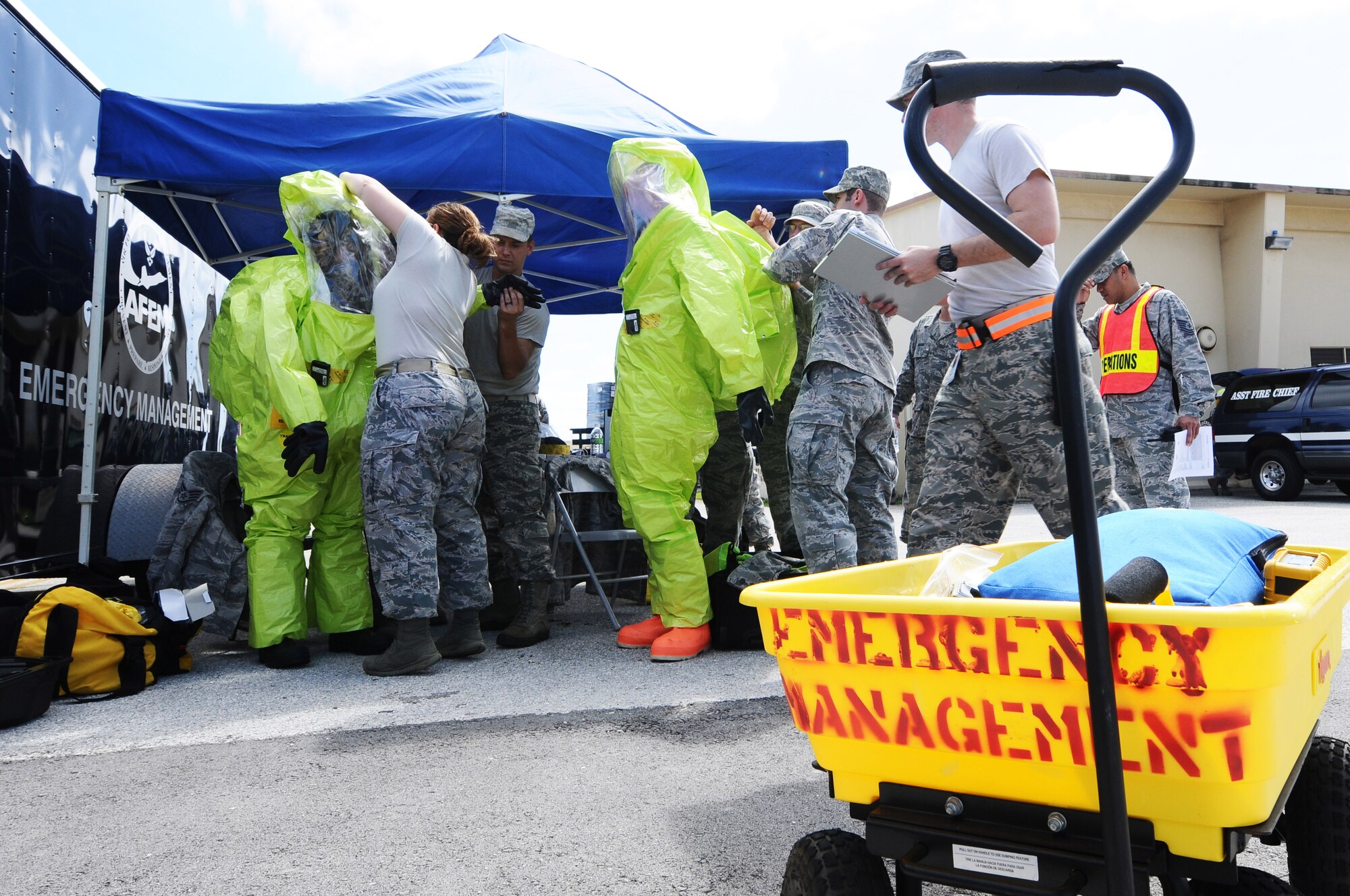 Members of 36th Medical Operations Squadron bioenvironmental engineering conduct chemical protective procedures in response to a hazardous material investigation during an operational readiness exercise on Andersen Air Force Base, Guam, Jan. 14, 2013. (U.S. Air Force photo by Senior Airman Carlin Leslie/Released)