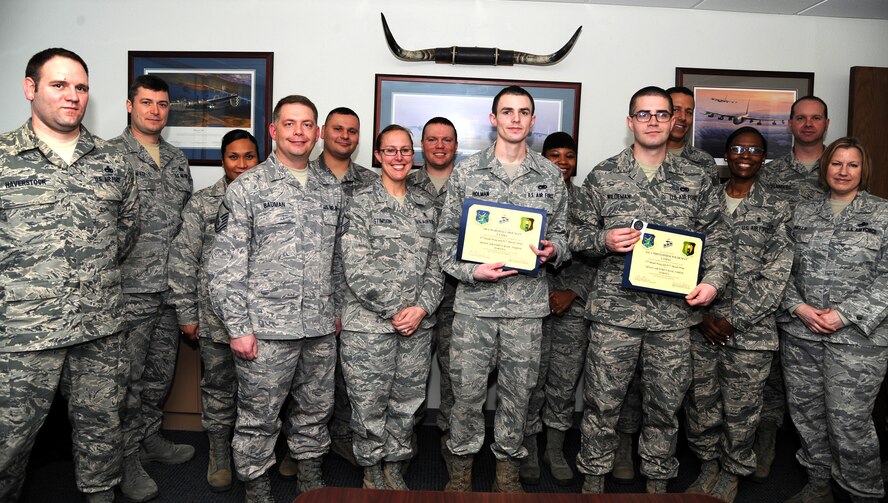 MINOT AIR FORCE BASE, N.D. -- Senior Airman Marshall Holman and Airman 1st Class Christopher Wildeman, both assigned to the 5th Aircraft Maintenance Squadron, were recognized by the Minot Top 3 here, Jan. 8. Holman and Wildeman were acknowledged for their extraordinary efforts and response in saving a child who was accidently locked in a car during a particularly hot day in September 2012. (U.S. Air Force photo/Airman 1st Class Andrew Crawford)