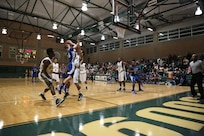 Gage Belyeu, Randolph High School Ro-Hawks basketball player, takes a shot against the Robert G. Cole High School Cougars Jan 11. at Joint Base San Antonio-Fort Sam Houston. The Ro-Hawks have an overall record of 16-3 and a 4-1 division record. (U.S. Air Force photo by Joshua Rodriguez)
