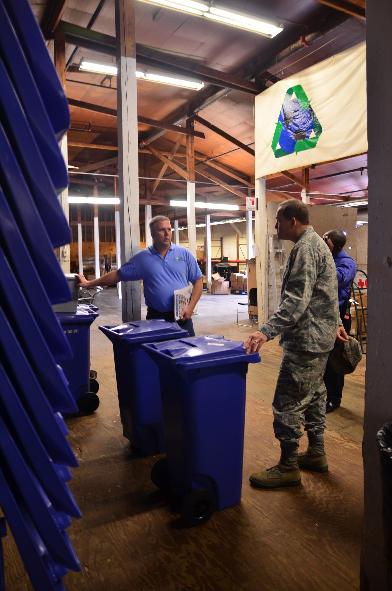 Doug Smith, Zero Waste Solutions and Mark Dunning Industries project manager, explains Keesler's recycling program to Maj. Gen. Tim Byers, the Air Force Civil Engineer and Installation Excellence Selection Board member, Jan. 11, 2013, at the Recycling Center, Keesler Air Force Base, Miss.  Keesler is one of the top two bases competing for the Commander-in-Chief's Annual Award for Installation Excellence with a $1 million top prize for quality of life initiatives.  Keesler showed the board members various examples of team problem solving, unit cohesiveness and enhanced productivity throughout their two-day visit.  (U.S. Air Force photo by Senior Airman Heather Heiney)