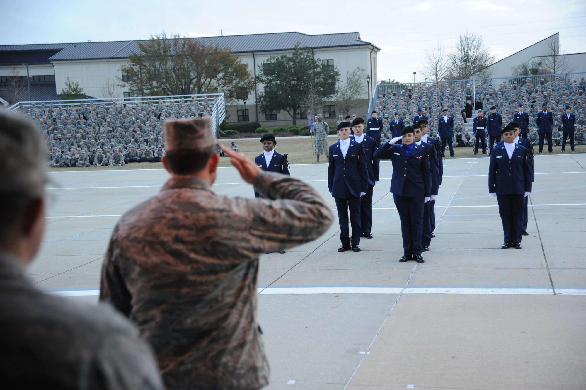 Maj. Gen. Timothy Byers, the Air Force Civil Engineer and Installation Excellence Selection Board member, welcomes the 335th Training Squadron drill team to the field of regulation drill competition during a drill down demonstration Jan. 11, 2013, at the Levitow Training Support Facility, Keesler Air Force Base, Miss.  The demonstration was the end of a two-day visit by the IESB in which Keesler showed the board members various examples of team problem solving, unit cohesiveness and enhanced productivity.   Keesler is one of the top two bases competing for the Commander-in-Chief's Annual Award for Installation Excellence with a $1 million top prize for quality of life initiatives.  (U.S. Air Force photo by Kemberly Groue)