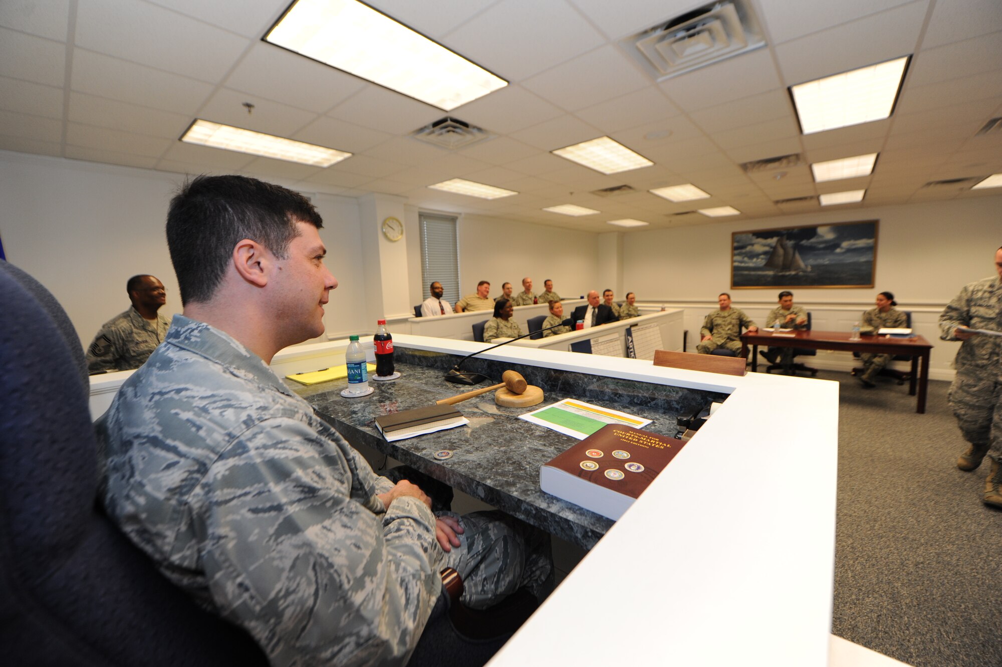 Col. Andrew Gebara, Installation Excellence Selection Board member, acts as a judge during a briefing provided by the 81st Training Wing’s Judge Advocate office Jan. 10, 2013, at the Sablich Center, Keesler Air Force Base, Miss.  The IESB visited the two finalist bases to evaluate how well the base improved work environments, quality of life and increased customer satisfaction to determine the winner of the Commander-in-Chief's Annual Award for Installation Excellence.  The first-place base wins $1 million towards quality of life initiatives while the second-place base earns $500,000.  (U.S. Air Force photo by Kemberly Groue)