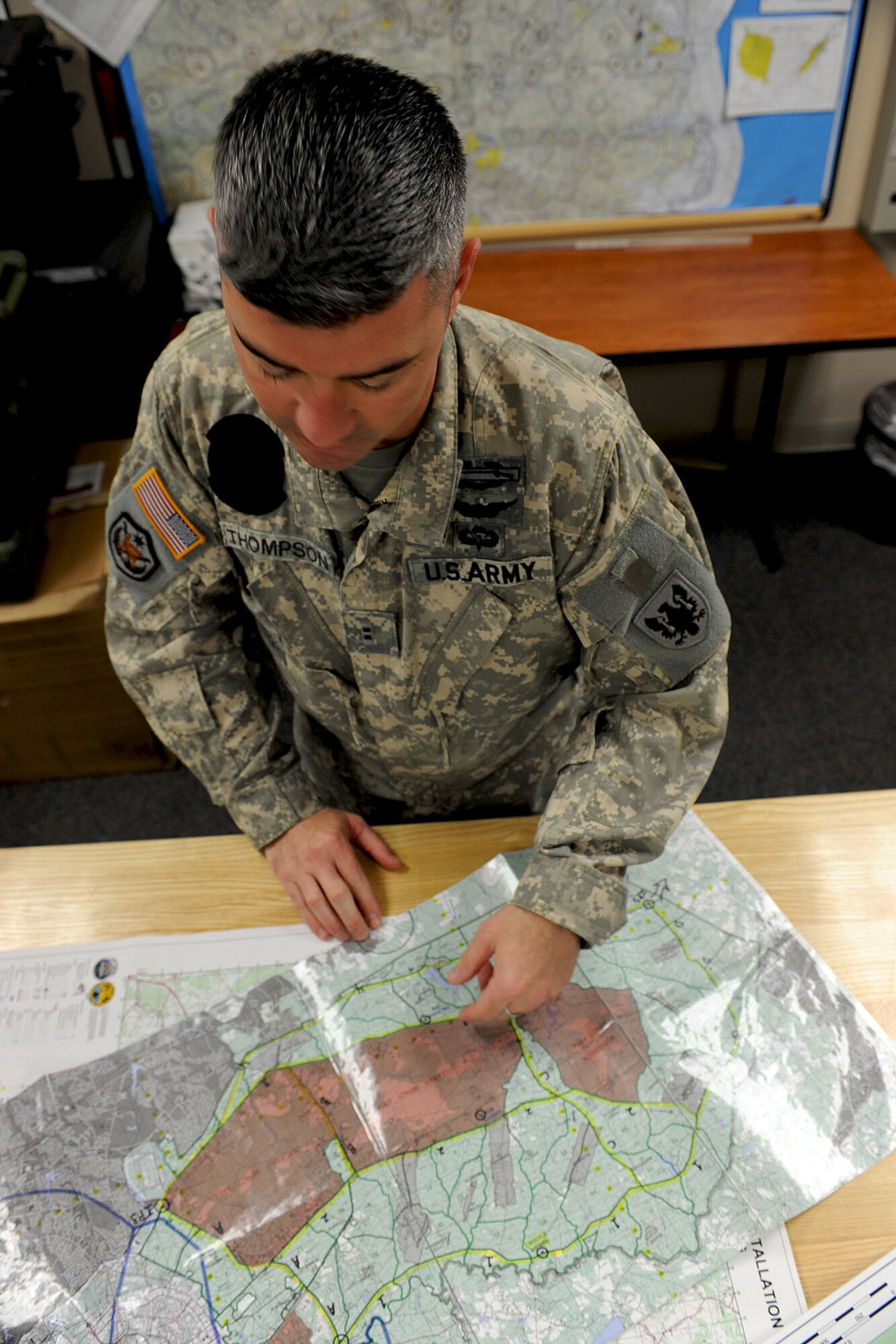 U.S. Army Reserve Chief Warrant Officer 2 Tyler Thompson, a CH-47 Chinook pilot assigned to the 5th Battalion, 159th Aviation Regiment, reviews flight routes at Fort Eustis Va., Jan. 10, 2013. Thompson developed many of the flight plans for the unit's role in the Defense CBRN Response Force mission, in which the battalion will deploy eight aircraft and up to 150 personnel within a 24-hour period anywhere in the nation to support relief efforts following catastrophic terrorist or natural disaster events. (U.S. Air Force photo by Staff Sgt. Ashley Hawkins/Released)
