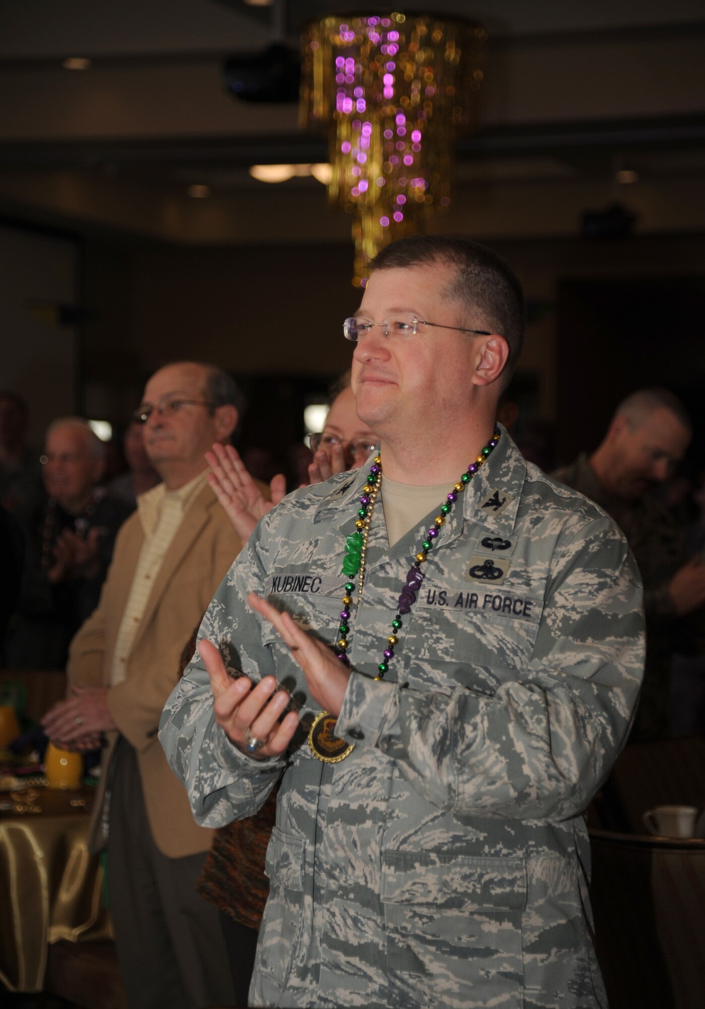 Col. John Kubinec, Installation Excellence Selection Board member, attends the Mardi Gras-themed breakfast with civic leaders and base leadership Jan. 10, 2013, at the Bay Breeze Event Center, Keesler Air Force Base, Miss.  The IESB visited the two finalist bases to evaluate how well the base improved work environments, quality of life and increased customer satisfaction to determine the winner of the Commander-in-Chief's Annual Award for Installation Excellence.  The first-place base wins $1 million towards quality of life initiatives while the second-place base earns $500,000.  (U.S. Air Force photo by Kemberly Groue)