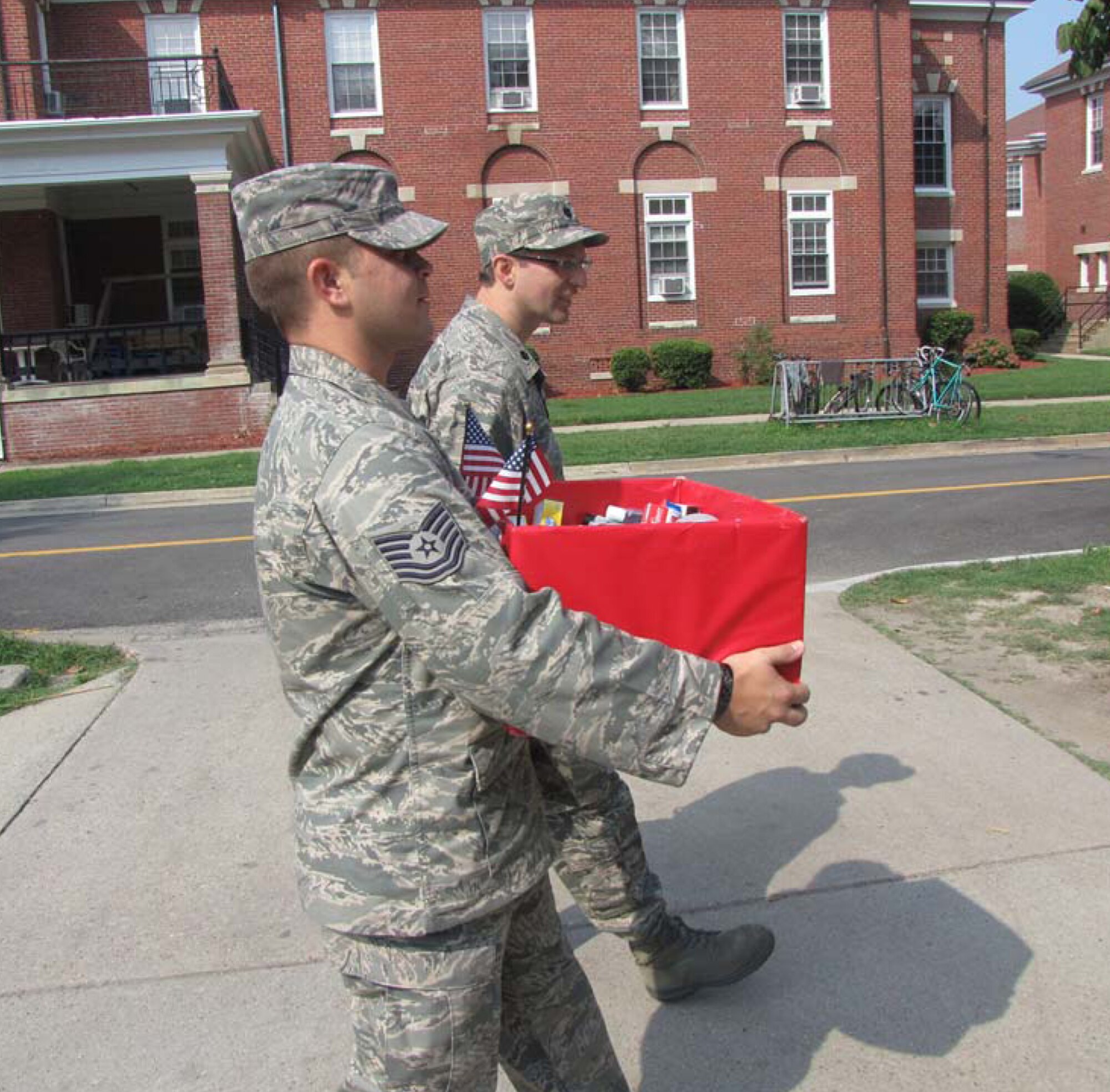 Tech. Sgt. Anthony Perasso and Lt. Col. John Bartrum, deliver a box of toiletries to the local Veterans Affairs Homeless Program. Each unit training assembly the 920th AMDF places a collection suitcase at the customer sign-in counter, allowing Reservists throughout the base to donate toiletries such as soap, shampoo, shaving cream and lotion. These donations are then delivered to the local Veterans Affairs staff who distributes them to local homeless veterans.  (Courtesy photo) 