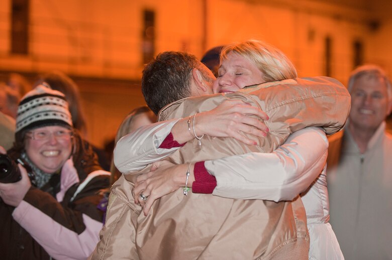 Family members of the returning Airmen anxiously await the 140th Wing members' arrival in the middle of the night Jan. 9 at Buckley AFB, Colo. (Air National Guard Photo by Tech. Sgt Wolfram Stumpf)