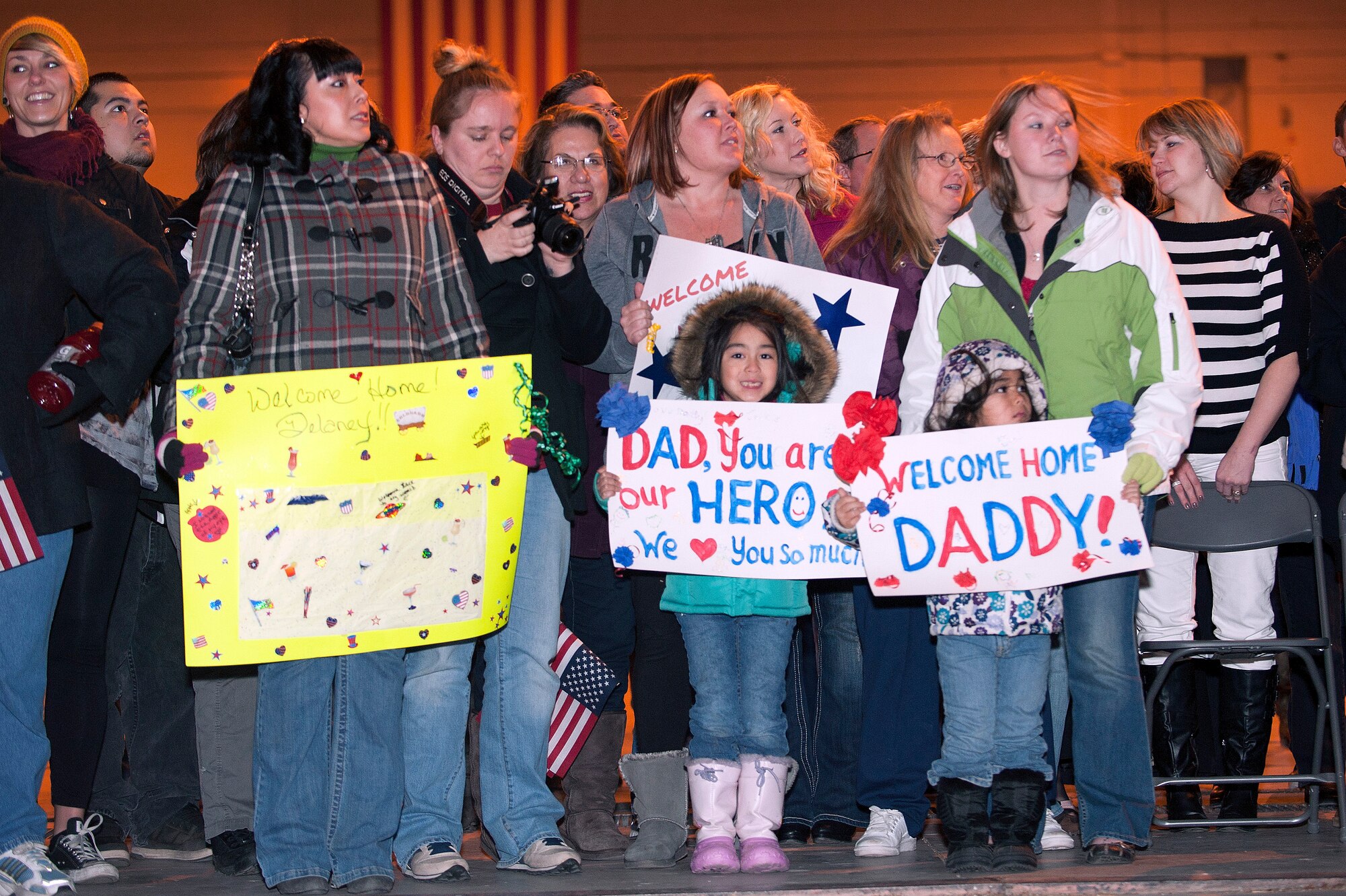 Family members of the returning Airmen anxiously await the 140th Wing members' arrival in the middle of the night Jan. 9 at Buckley AFB, Colo. (Air National Guard Photo by Tech. Sgt Wolfram Stumpf)