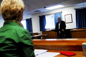 Pauline Riddick, Fort Eustis education center academic advisor, receives an injured party briefing in the judge advocate courtroom at Fort Eustis, Va., Jan. 8, 2013. The briefing is part of the Assistance to Injured Parties Program, which gives legal advice to all military personnel, family members and retirees about how to claim personal injuries after an accident. (U.S. Air Force photo by Staff Sgt. Ashley Hawkins/Released)
