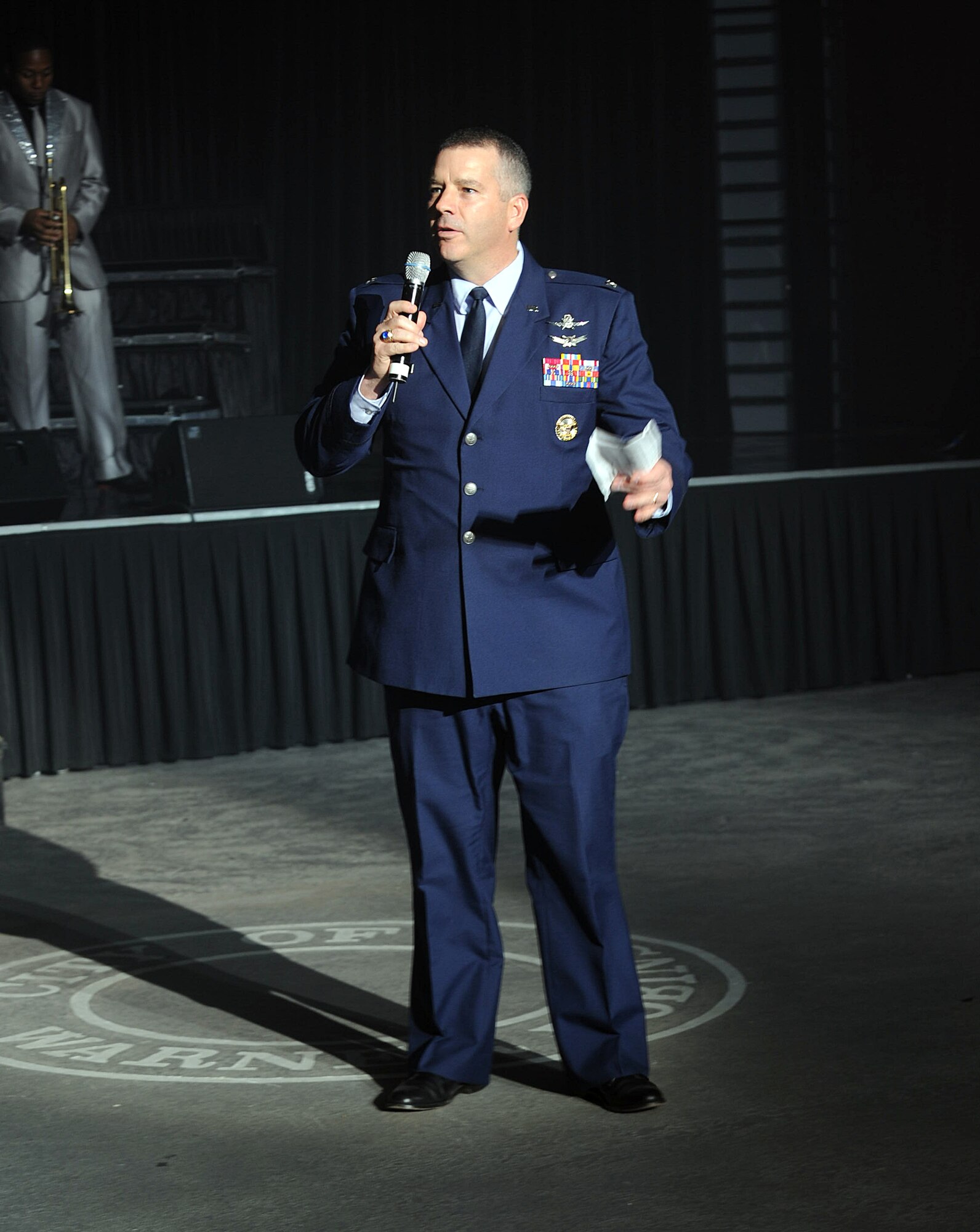 Col. Mitch Butikofer address the crowd at the Warner Robins Civic Center, where Tops in Blue performed Jan. 12.