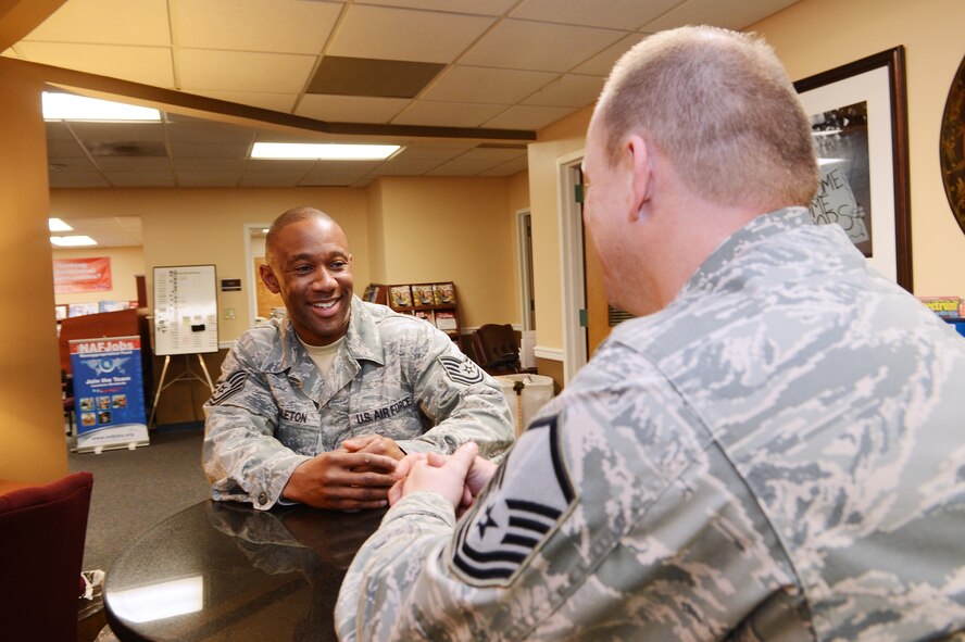 U.S. Air Force Tech. Sgt. Evan Singleton briefs Master Sgt. Brian Melton, both 20th Force Support Squadron, Airman & Family Readiness Center, readiness non commissioned officers at Shaw Air Force Base, S.C., Jan. 14, 2013.   Singleton is the Shaw Spotlight for the week of Jan. 9 - 14. (U.S. Air Force photo by Airman 1st Class Nicole Sikorski/Released)