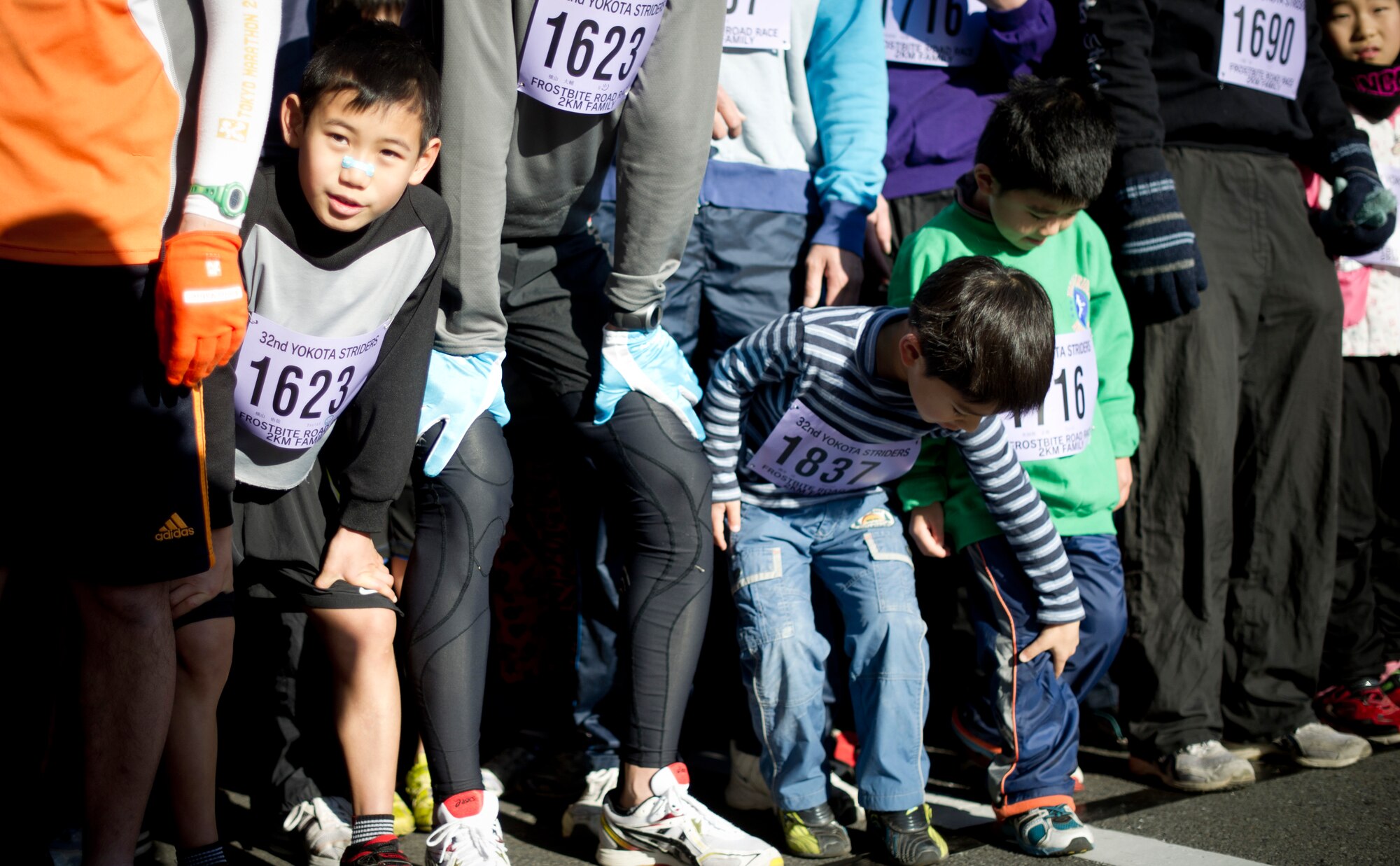 YOKOTA AIR BASE, Japan -- Japanese children begin the 2k race portion of the annual Frostbite Run Jan. 13, 2013, at Yokota Air Base, Japan. This year's event welcomed more than 10,000 Japanese runners to participate in three different races. (U.S. Air Force photo by Staff Sgt Stacy Moless)
