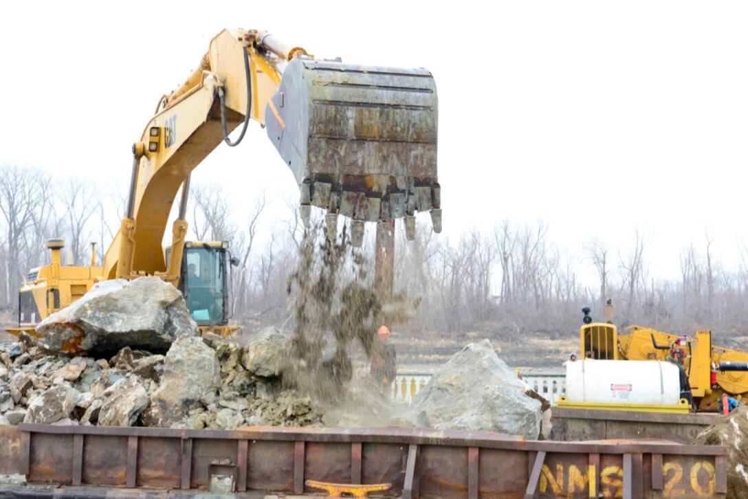 The removal of 890 cubic yards of limestone from the navigation channel on the Mississippi River near Thebes, Ill., began Dec. 17, 2012. This is just one phase of the action the Corps is taking to improve the navigation channel for the river industry.